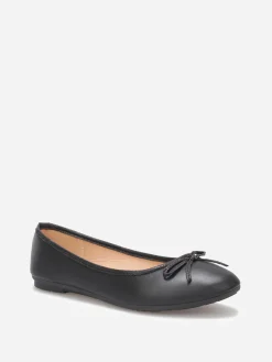 Discount La Modeuse Ballerines à bout rond et n艙ud Noir
