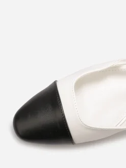 La Modeuse Ballerines slingback à bout contrastant Blanc