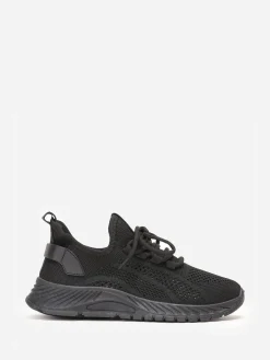 Sale La Modeuse Baskets running  en maille ajourée Noir