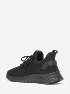 Sale La Modeuse Baskets running  en maille ajourée Noir