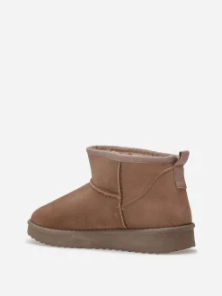 Online La Modeuse Boots basses en suédine fourrées Taupe