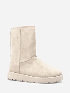 La Modeuse Boots en suédine fourrées Beige