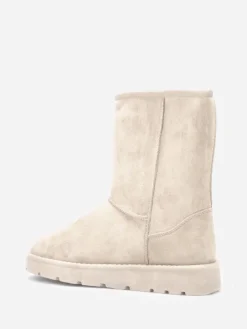 La Modeuse Boots en suédine fourrées Beige