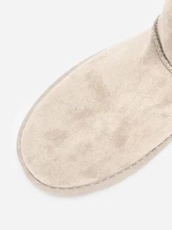 La Modeuse Boots en suédine fourrées Beige