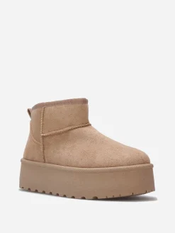 Hot La Modeuse Boots en suédine fourrées à plateforme Taupe