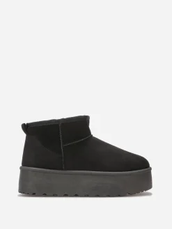 Online La Modeuse Boots en suédine fourrées à plateforme Noir