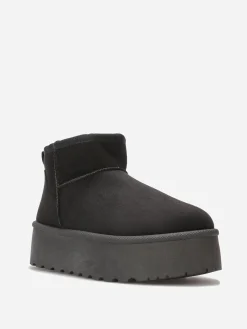 Online La Modeuse Boots en suédine fourrées à plateforme Noir
