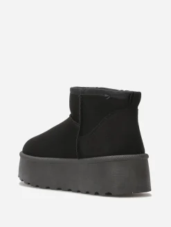 Online La Modeuse Boots en suédine fourrées à plateforme Noir