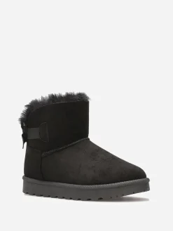 Best La Modeuse Boots en suédine fourrées à ruban noué Noir