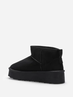 Online La Modeuse Boots fourrées à plateforme Noir