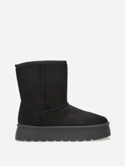 New La Modeuse Boots fourrées à plateforme Noir