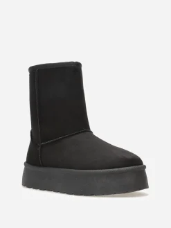 New La Modeuse Boots fourrées à plateforme Noir