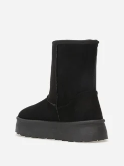 New La Modeuse Boots fourrées à plateforme Noir