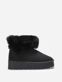 Outlet La Modeuse Boots fourrées à plateforme et n艙ud Noir