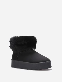 Outlet La Modeuse Boots fourrées à plateforme et n艙ud Noir