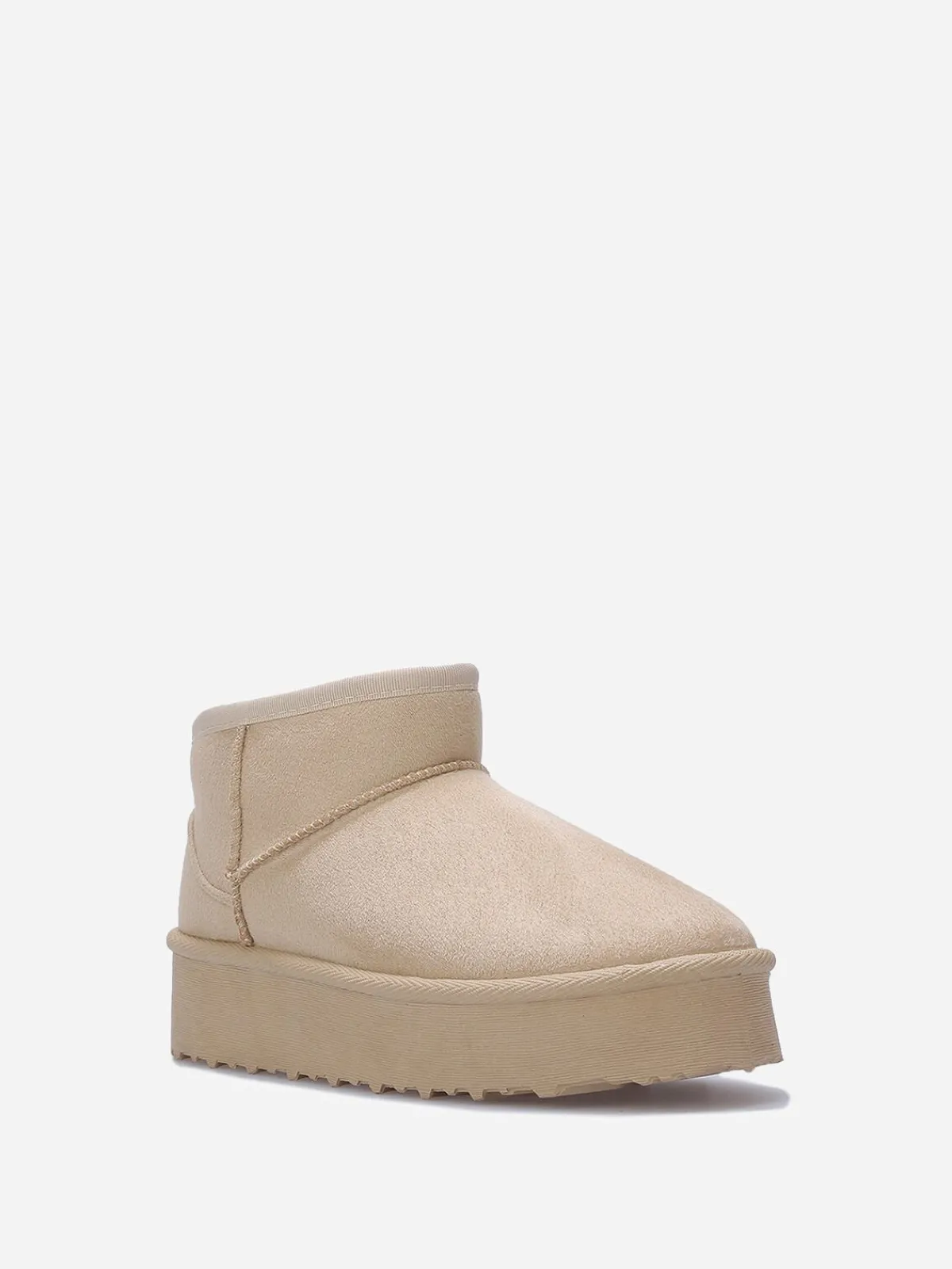 La Modeuse Boots fourrées à plateforme Beige