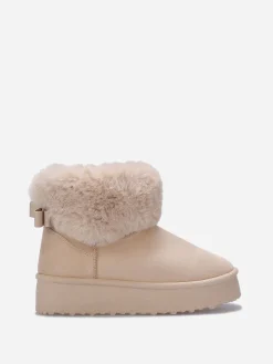New La Modeuse Boots fourrées à plateforme et n艙ud Beige
