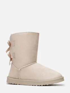 New La Modeuse Boots fourrées à rubans noués Beige