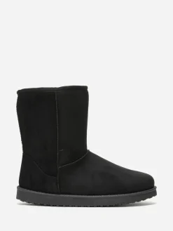 Discount La Modeuse Boots fourrées à semelle épaisse Noir