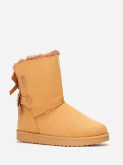 Best La Modeuse Boots fourrées en suédine à rubans Camel