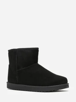 Sale La Modeuse Boots fourrées en suédine grandes tailles Noir