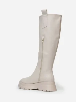 New La Modeuse Bottes  crantées avec larges languettes Beige