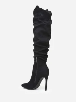 La Modeuse Bottes  en suédine à talon fin et bout pointu Noir