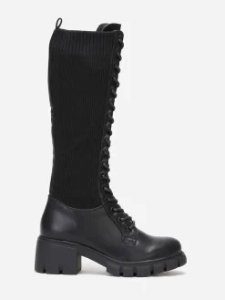 Outlet La Modeuse Bottes rangers crantées bi-matières Noir