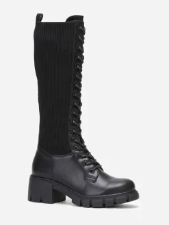 Outlet La Modeuse Bottes rangers crantées bi-matières Noir