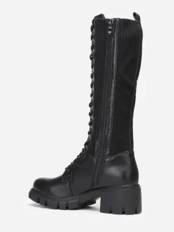 Outlet La Modeuse Bottes rangers crantées bi-matières Noir