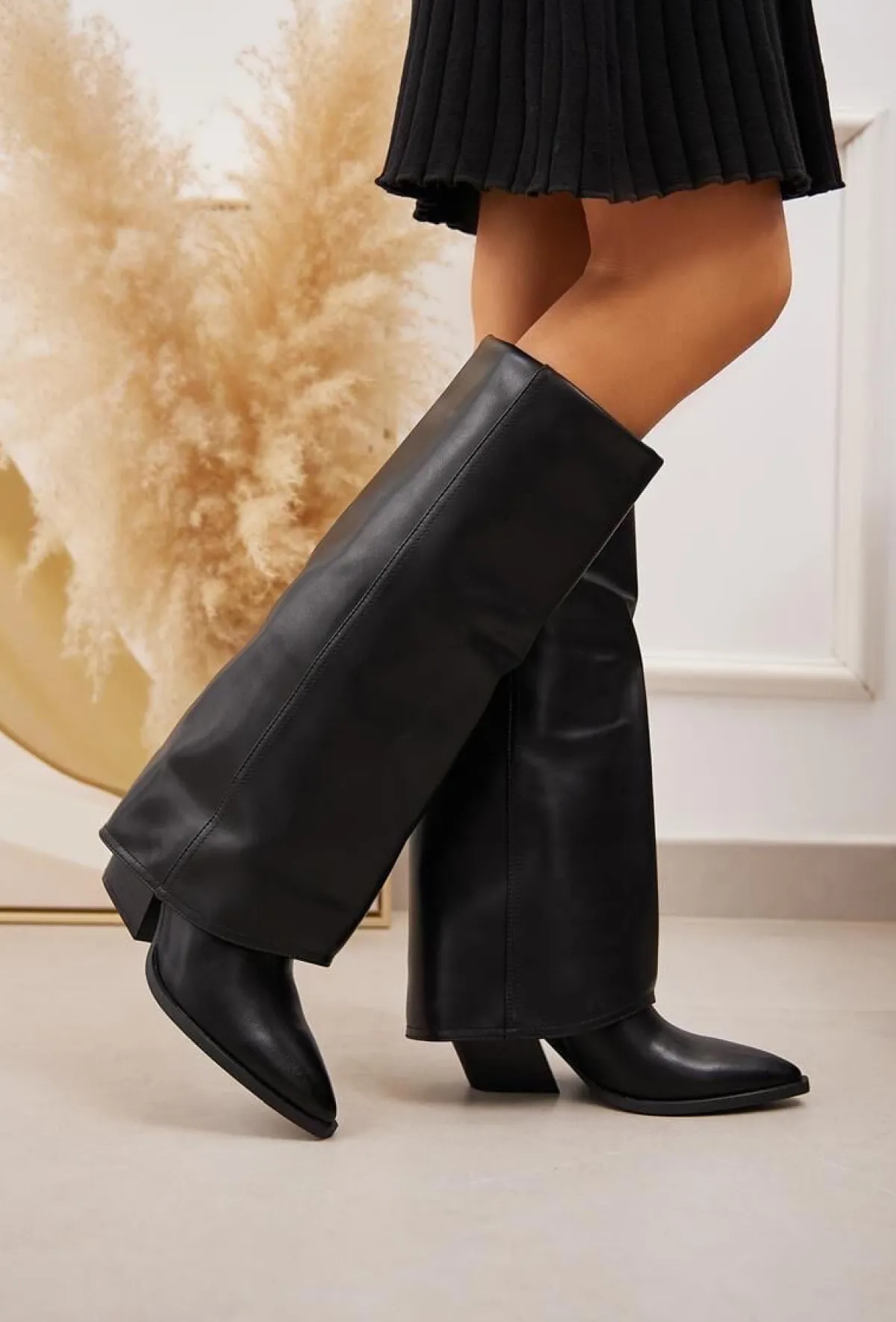 Discount La Modeuse Bottes santiags à talon et revers Noir