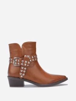 New La Modeuse Bottines à bride cloutées et nouée Camel