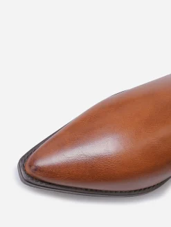 New La Modeuse Bottines à bride cloutées et nouée Camel