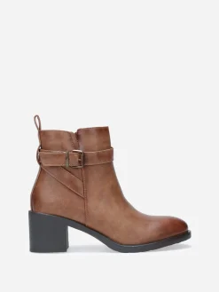 New La Modeuse Bottines à bride et boucle métallique Marron