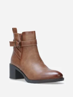 New La Modeuse Bottines à bride et boucle métallique Marron