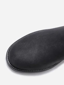 Hot La Modeuse Bottines à effet mat pailleté avec boucles Noir