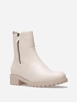 Hot La Modeuse Bottines à empiècements et zip décoratif Beige
