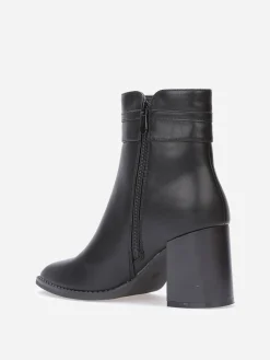 La Modeuse Bottines à talon carré et mors doré Noir