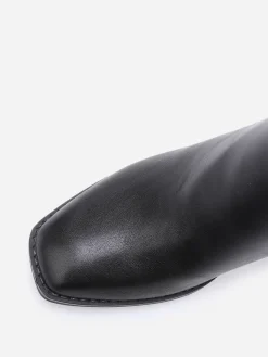 La Modeuse Bottines à talon carré et mors doré Noir