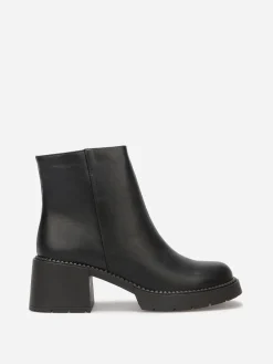 New La Modeuse Bottines à talon et semelle crantés Noir