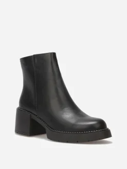 New La Modeuse Bottines à talon et semelle crantés Noir