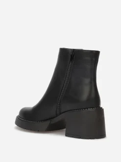 New La Modeuse Bottines à talon et semelle crantés Noir