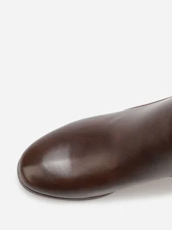La Modeuse Bottines bi-matière avec boucle dorée Marron