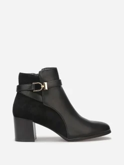 Sale La Modeuse Bottines bi-matière avec boucle dorée Noir