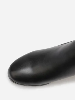 Sale La Modeuse Bottines bi-matière avec boucle dorée Noir