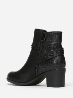 New La Modeuse Bottines bi-matières avec bride à boucle Noir