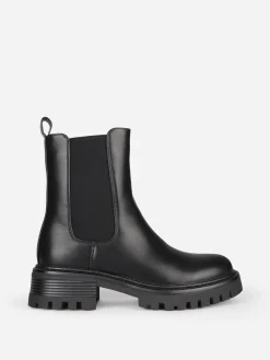 New La Modeuse Bottines chelsea à semelle chunky Noir