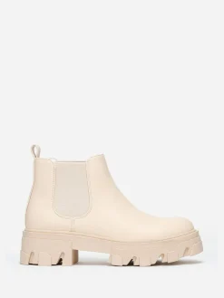 New La Modeuse Bottines chelsea basses à semelle crantée Beige