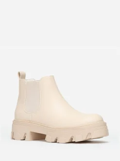 New La Modeuse Bottines chelsea basses à semelle crantée Beige