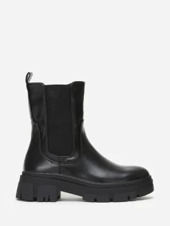 Outlet La Modeuse Bottines chelsea crantées en simili Noir